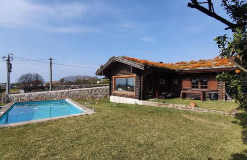 Carreco Casa | Encantadora moradia T1, com piscina e vista mar a 500m da praia