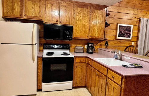 Eureka Springs Cabina | Cabina de lujo con cubierta envolvente y bañera de hidromasaje