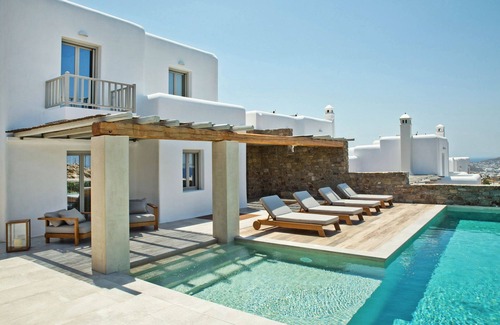 Tourlos Villa | Endearing Mykonos Villa | Villa Riddle | 5 Bedrooms | Breathtaking Sea Views | Spacious Furnished Sun Terrace | Private Outdoor Pool | BBQ Facilities | Shaded Outdoor Dining Area | Private Gym | Agia Sofia, Tourlos Aside