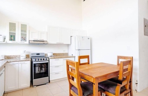 El Ocotal Condominio | Enjoy a tropical getaway in this modern one-bedroom, two-bathroom condo near Ocotal Beach