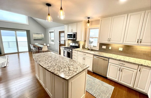 Beulah Casa | Enjoy Crystal Lake's pristine water and amazing sunsets from this lakefront home