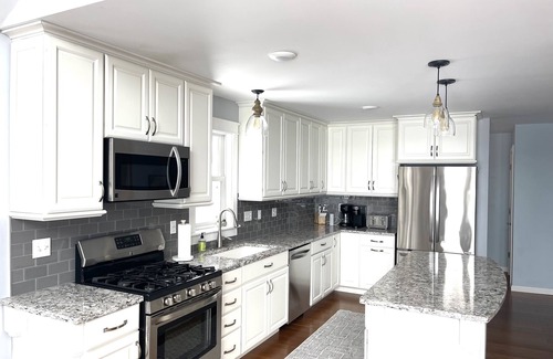 Beulah Casa | Enjoy Crystal Lake's pristine water and amazing sunsets from this lakefront home