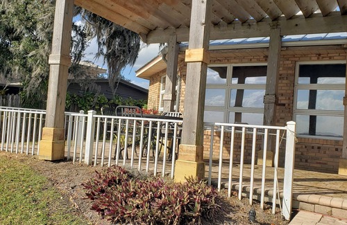 St. Cloud Casa | Enjoy fabulous lake views from your porch while sipping on a morning coffee.