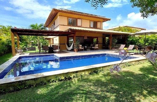 Praia do Forte Casa | Casa 4 suites, en Praia do Forte, cerca de la playa y la villa.