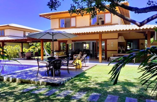 Praia do Forte Casa | Casa 4 suites, en Praia do Forte, cerca de la playa y la villa.