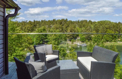 Dalaro Casa | Enjoy relaxing baths in the jacuzzi with sea view in this vacation home.