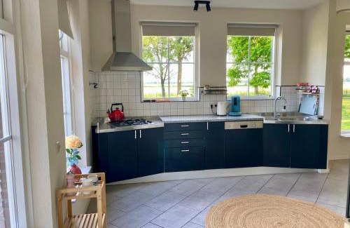 Oosterwolde Casa | Enjoy the space and countryside at Het Hofhuys