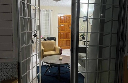 New Kingston Apartamento | Enjoy this central, stylish 1 bedroom apt. with AC, wi-fi, security, and more!