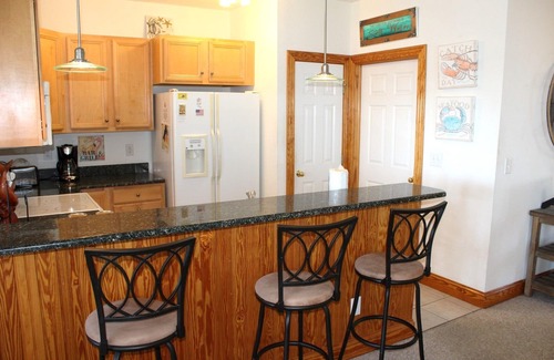 Manteo Condominio | Sailfish Point Villa 5201 - Maravilloso condominio frente al puerto deportivo