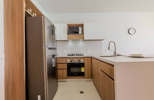 Zona Norte Apartamento | Espectacular vista a laguna de Kristal/1 alcoba