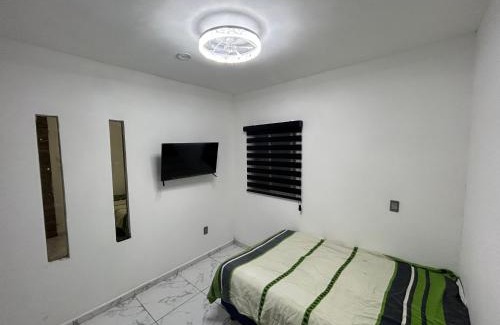 Mazatlan Apartamento | Estancia cuarto completo