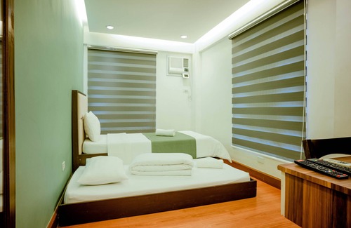 Capas Hotel | Estancia De Lorenzo Tarlac