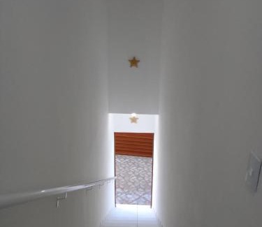 Prea Apartamento | Estrela Apartamento 2 terreo - Quarto e sala com cozinha americana na praia do prea-Ce