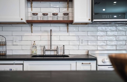 Windsor Park Casa | Euro-inspired 1-br cottage with AC, w/d, private fenced yard in central Austin