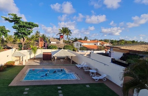 Vilas do Atlantico Casa | Excelente casa de playa con piscina, amplio y agradable jardín, cerca de la playa.