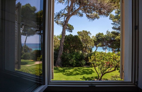Santa Margherita di Pula Villa | villa exclusiva frente al mar acceso directo a la playa con piscina privada