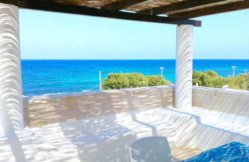 L'Assunta Apartamento | Exclusive and charming roof terrace apartment just 20 m from the sea