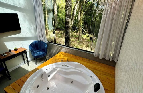 Carniel Casa | Exclusive Loft with Jacuzzi and Fireplace