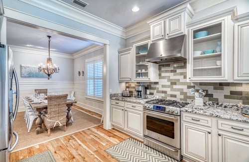 WaterSound West Beach Casa | Hermosa propiedad frente al mar con carrito de golf de seis plazas