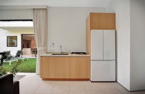 Beverly Grove Casa | Expansive 6-bedroom residence in prime West Hollywood, bright open living,