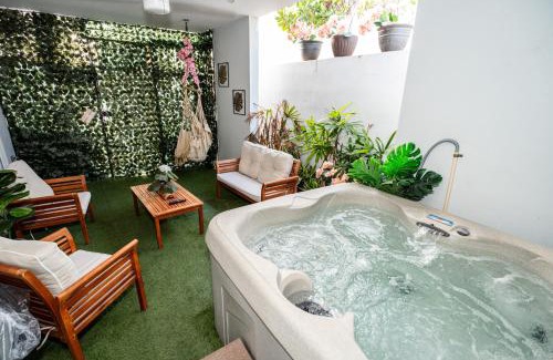 Bucana Casa | Expansive Paradise with Private Jacuzzi and Tropical Patio