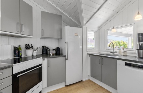 Kirke Hyllinge Casa | Experience a wonderful break in this holiday home with fjord views.