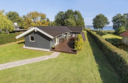 Kirke Hyllinge Casa | Experience a wonderful break in this holiday home with fjord views.