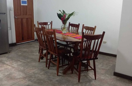 San Ignacio Apartamento | Experience comfort and relaxation in our air-conditioned apartment, featuring two spacious bedrooms, a welcoming living room, a fully equipped private kitchen, and a well-appointed private bathroom. Perfect for families or groups.