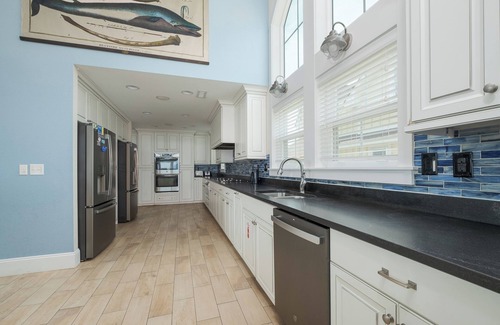 Kill Devil Hills Casa | Experience luxury at Seas the Day, a stunning 15-bedroom oceanfront retreat in Kill Devil Hills