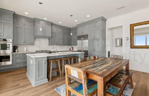 Ocean Cay Casa | Experience oceanfront luxury at 1088 S. Fletcher Ave, a spacious 5-bedroom house