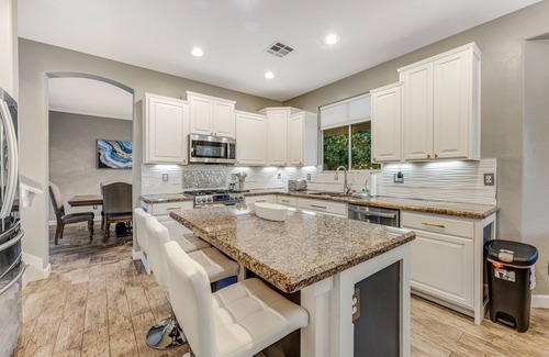 Terramar Casa | Exquisite home with firepit, game room, heated pool, pool spa, & putting green