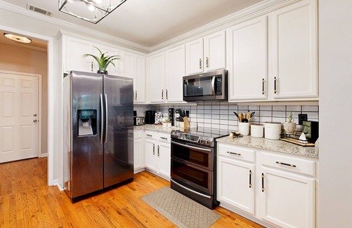 East Point Casa | Exquisite home with charming deck, washer/dryer, & central AC