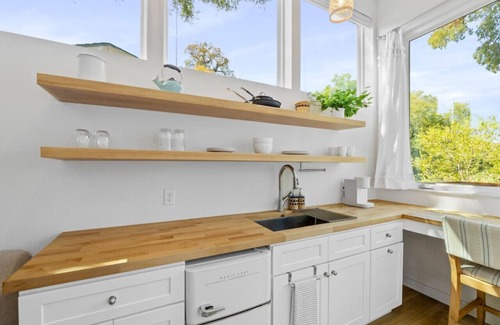 East MLK Casa | Extended Stay Haven: A+ Deck w/ Greenbelt Views!