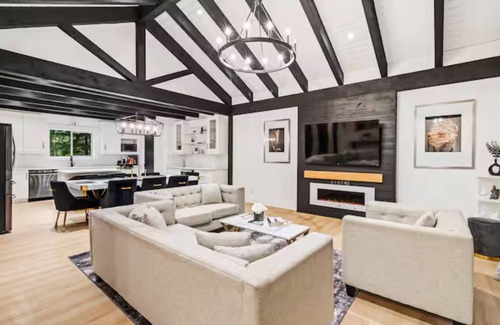 Swansea Point Casa | Extraordinary home with pool,hot tub, sauna, gym, arcade & theatre.