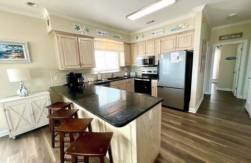 Surf Side Shores Casa | Beachfront Pet Friendly Duplex - Pools and Tennis