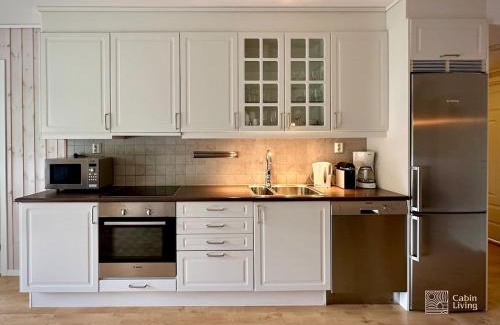 Hafjell Apartamento | Family friendly apartment in Hafjell ski in-out, fireplace, sauna and wifi