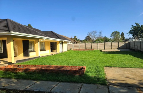 Harare Casa | Family friendly environment with a big garden and barbeque area