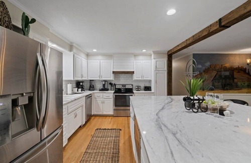 Candler Casa | Family Friendly Home with Hot Tub and Firepit
