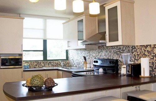 Mediania Alta Apartamento | Sandy Cove - Tres Habitaciones Piso, Capacidad 8