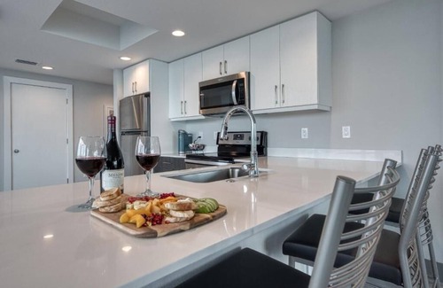 Treasure Island Hotel | Family Friendly Waterfront Retreat! 3 Modern Suites w/Pool & Free Parking!