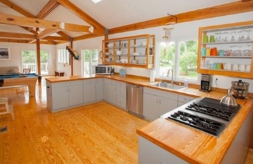 Croatan Beach Casa | Family-Friendly Sail Away Home with Billiard and Built-in Spa on the Deck by RedAwning