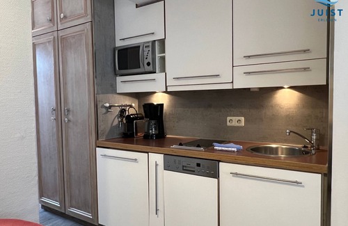 Juist Apartamento | Family-friendly vacation apartment with swimming pool and sauna, centrally located