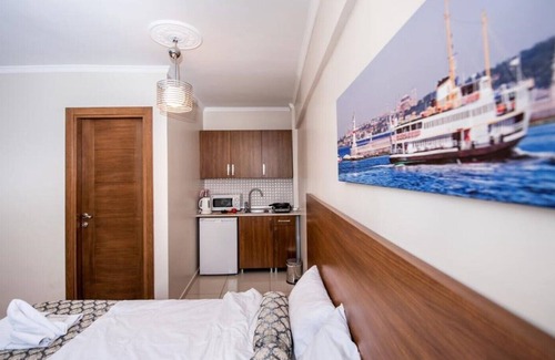 Emin Sinan Apartamento | Habitación familiar con vistas al mar