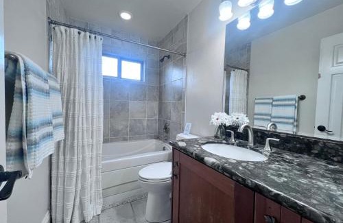 Southwest Anaheim Casa | Fantastic 5 Bedroom 4 bath home with new Pool & Jacuzzi