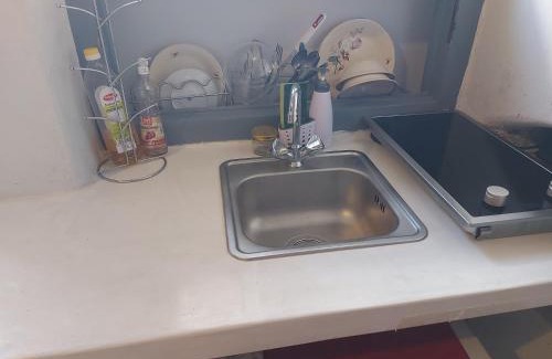 Filoti Casa | Fasolas square studio 15m2 is located 30 stairs up from the main road and it is in the old market fasolas and next to the museums