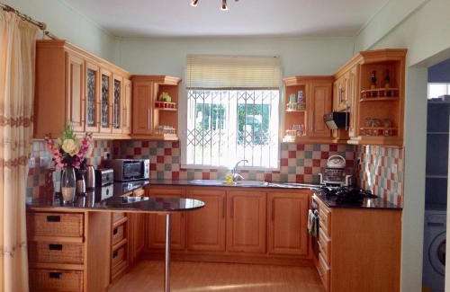 Flic-en-Flac Villa | Fayruz Villa is a 3 bedroom, 3 bathroom detached house with AC and swimming pool 5 minutes walk from Flic en Flac public beach