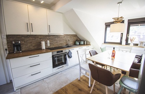 Bischofsheim an der Rhon Condominio | Ferienwohnungen Über den Dächern mit Familienbett