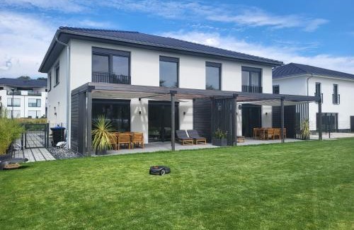 Muldestausee Casa | Ferienhaus Schlossterrassen 8b