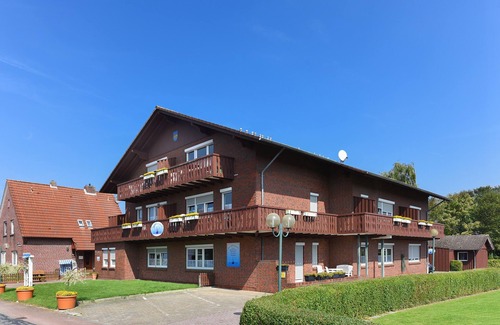 Neuharlingersiel Apartamento | Ferienwohnung Black Pearl - Haus Hafenromantik in Neuharlingersiel
