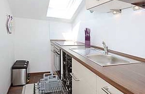 Neuharlingersiel Apartamento | Ferienwohnung Störtebecker - Haus Hafenromantik in Neuharlingersiel